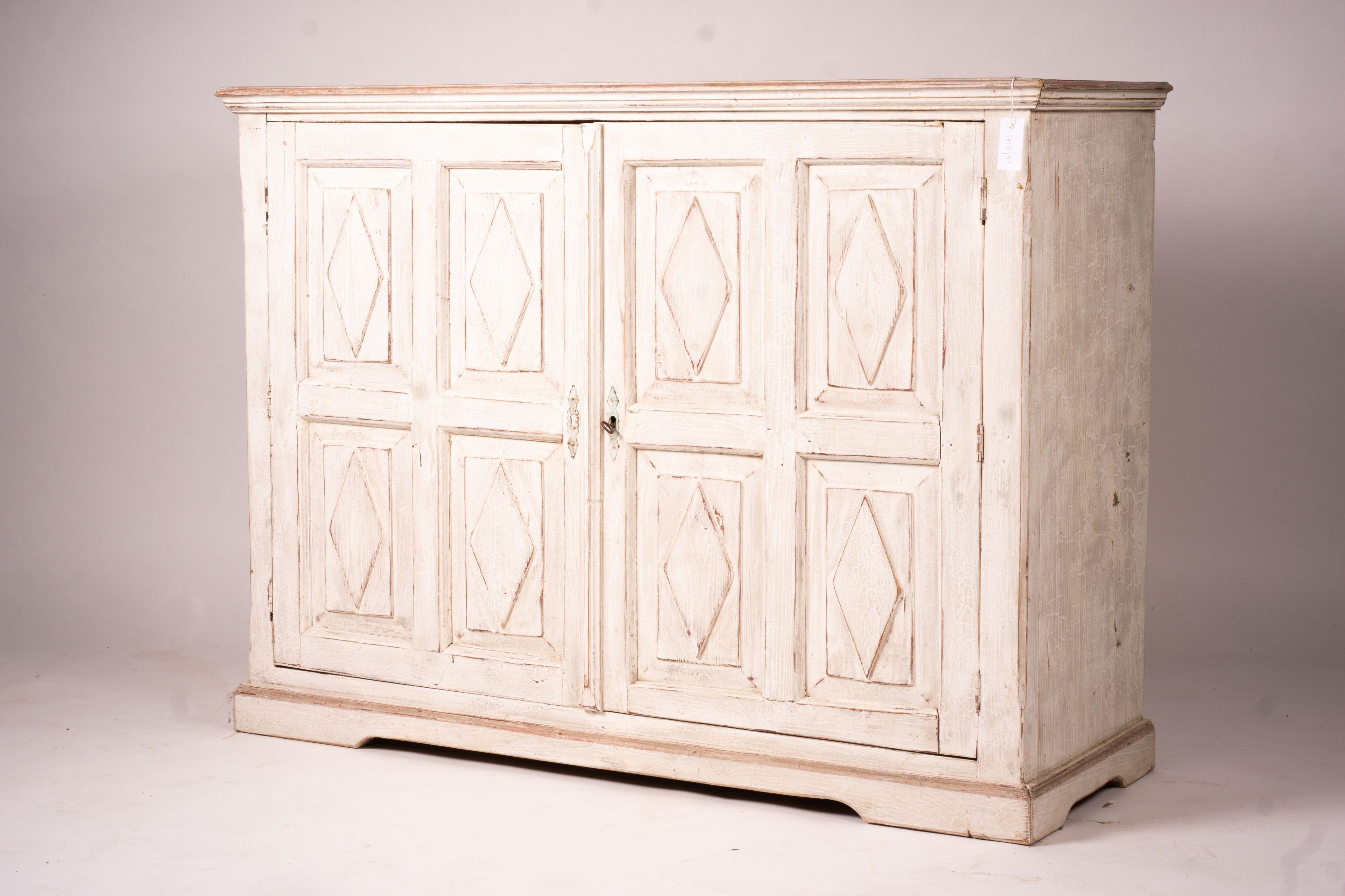 A 19th century Continental painted pine two door side cabinet, width 142cm, depth 50cm, height 106cm